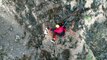 Watch the moment a dog trapped on a cliff wags joyfully at his rescuer