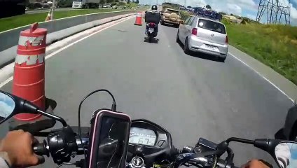 Motorcyclist Distracted by Cat Runs into Large Traffic Cone