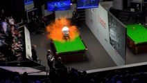 Protester interrupts World Snooker Championship and covers table with orange powder