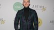 Russell Tovey believes Sir Elton John keeps archive of news photographs