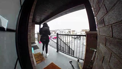 Woman Takes an Unfortunate Tumble Down Icy Steps