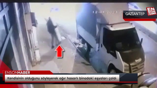 Kendisinin olduğunu söyleyerek ağır hasarlı binadaki eşyaları çaldı