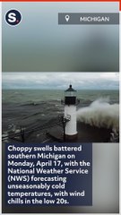 Large Waves Crash Against Michigan Lighthouse Amid Unseasonably Cold Temperatures