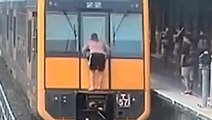 Buffer riding: Australian authorities warn against passengers riding back of train carriages