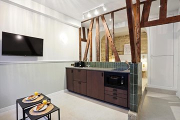 Dans le Marais, un 29 m2 vétuste transformé en une suite d'hôtel