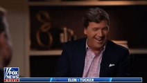 Fox host Tucker Carlson laughs as Elon Musk discusses Twitter layoffs