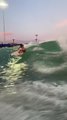 Duo Surfs Over High Waves at Wave Ranch