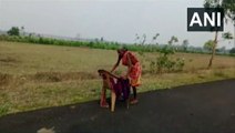 Watch: 70-year-old Indian woman walks miles barefoot with support of broken chair to collect pension money