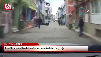 Bursa'da aracın altına kalmaktan son anda kurtulan kız çocuğu