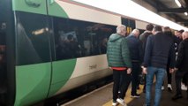 Brighton and Hove Albion fans getting on the train at Eastbourne ahead of FA Cup semi-final
