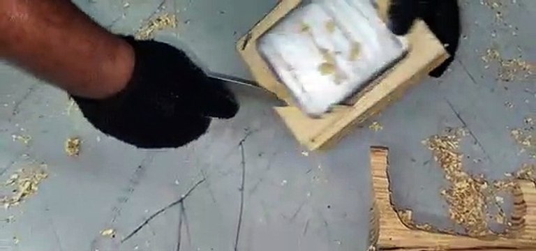 DNCD confisca 54 paquetes de cocaína escondidos en paleta de madera