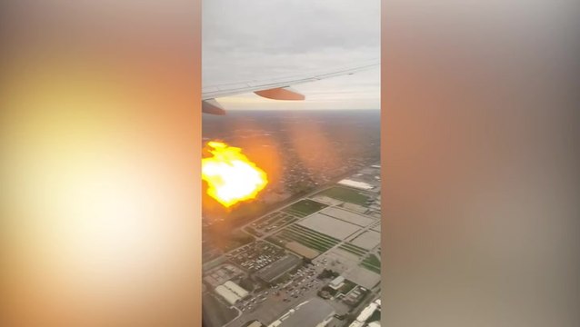 Passenger records flames raging from American Airlines engine mid-flight