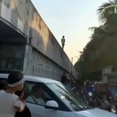 SURAT VIDEO/ फ्लाई ओवरब्रिज की दीवार पर युवक का स्टंट, वीडियो वायरल