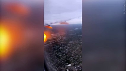 Flight returns to airport after engine catches fire due to possible bird strike