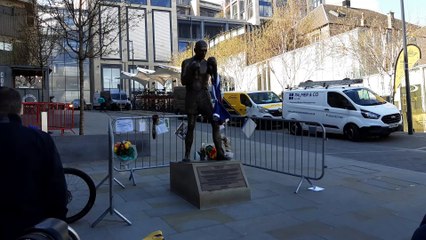 Ken Buchanan funeral procession passes his statue