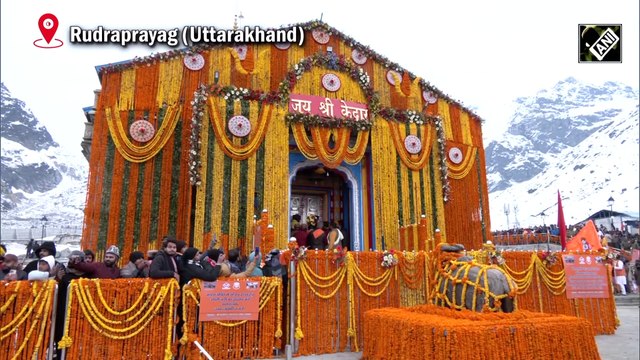 Devotees play drums as Kedarnath Dham open for pilgrims
