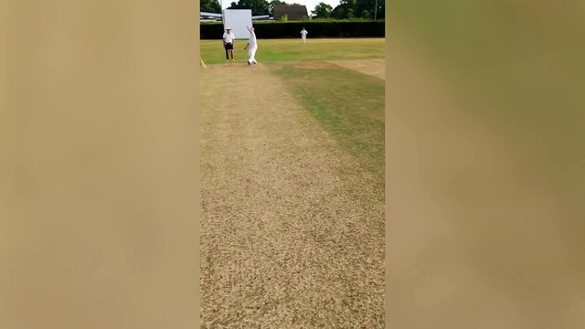 Headcam captures the moment cricket umpire was struck on the head by deflected ball