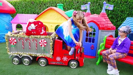 Diana Helps Santa delivering Christmas presents