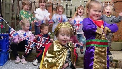 Nursery children receive a card from King Charles III