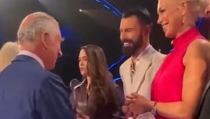 King Charles laughs with Rylan Clark and Hannah Waddingham at Eurovision set launch
