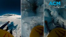 Terrifying moment skier falls into a crevasse