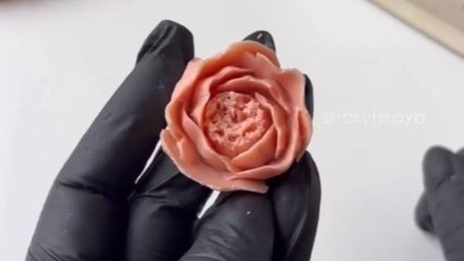 Cake artist puts her blossoming creativity to use to create an ethereal chocolate sculpture
