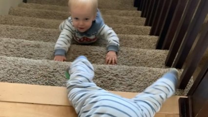 Excited twin boys head downstairs to meet their brother after his nap time