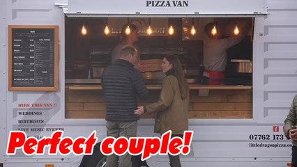 Prince William and Princess Kate chat happily while waiting for pizza to be delivered to rugby club