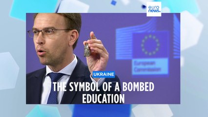 The shrapnel keyring showing Russian "barbarity" made by Ukrainian children