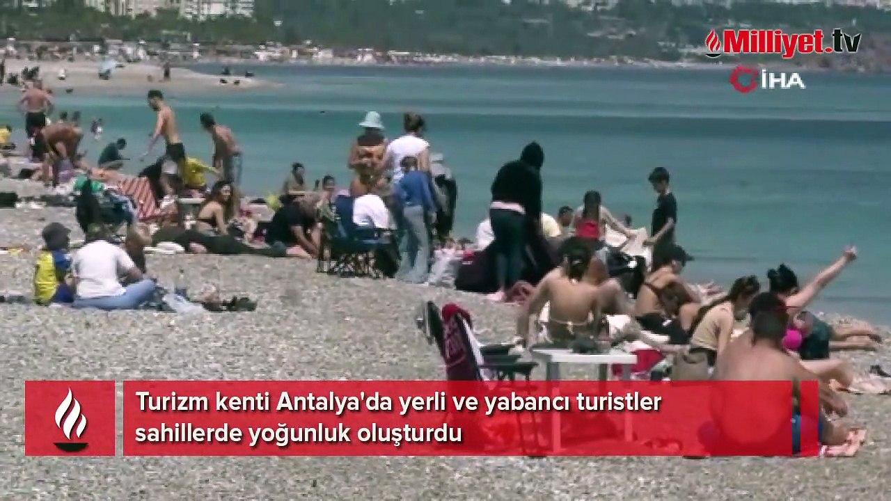 Antalya'da bahar sıcaklığı sahilleri doldurdu