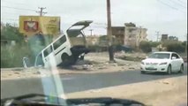 Destroyed vehicles and rubble in Bahri, Khartoum North as UK government prepares last evacuation flight