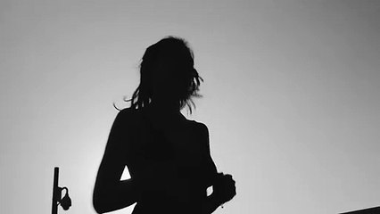 mixkit-silhouette-of-a-young-woman-jogging-in-front-of-the-40756-small