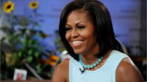 GALA VIDEO - Michelle Obama sur scène : elle vole la vedette à un très célèbre chanteur !