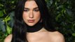 Dua Lipa Wore a Deconstructed Strapless Sweater Dress With Towering Platform Boots Ahead of the 2023 Met Gala
