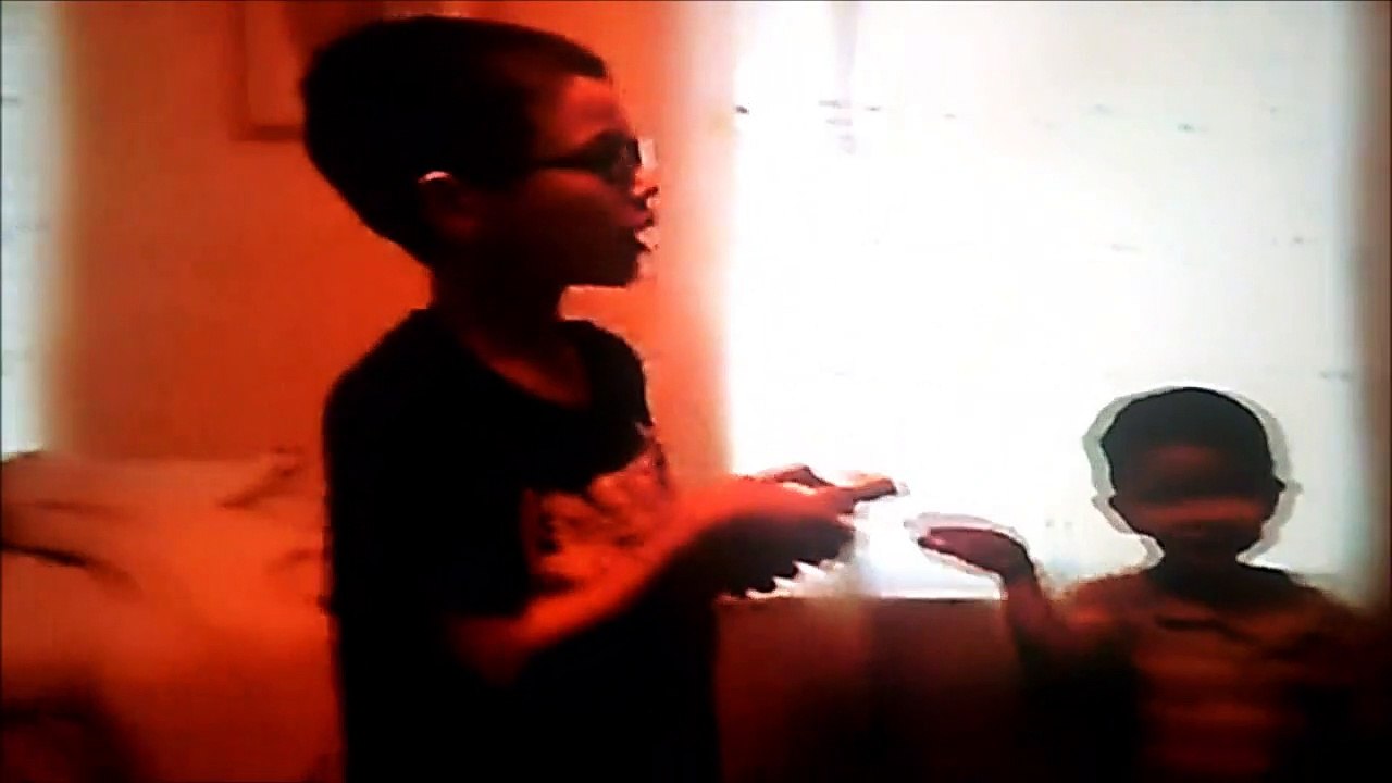 Jonathan plays the wii while Christopher annoys him & plays the wii