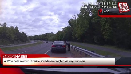 ABD’de polis memuru üzerine sürüklenen araçtan kıl payı kurtuldu
