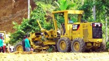 Caterpillar 120K Grader VHP-145 Works to Push the Soil Evenly