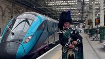 Bagpiper serenades new Coronation train at Edinburgh Waverley