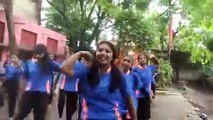 Girl students learning zumba in government school summer camp, getting