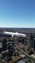 fly over the tall buildings of the Swiss airplane
