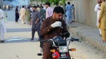 Police clash with protesters in Peshawar following Imran Khan's arrest - AFP