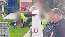 Video appears to show police officer repeatedly punching a man in the head