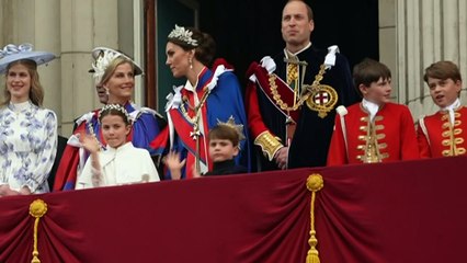 Cheeky Prince Louis up to mischief on Palace balcony