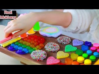 Video herunterladen: ASMR MUKBANG Rainbow Desserts! Push pop Jelly, Condensed milk Chocolate, Chewy Ice cream, Kohakuto.