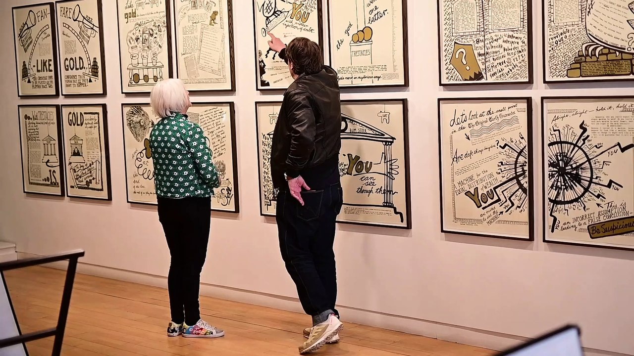 Artist and curator, Willie Sutherland speaks at the George Wyllie: A Day Down a Goldmine exhibition.