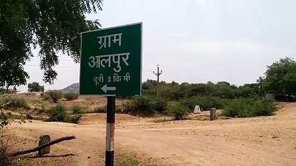 The population of the village with the help of two handpumps, neither paved road nor tap-water scheme