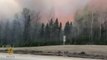 Wildfires leave sky thick with smoke as 25,000 forced to flee western Canada