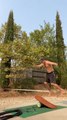 Guy Shows Balancing Skills While Moving Over Rola-Bola and Exercise Ball From Slackline