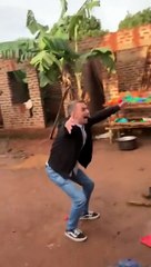 children at an orphanage in Uganda greet a man who is helping them with so much joy and appreciation
