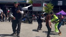 NEVER TOO OLD TO DANCE: Old man busts out the moves gatecrashing a music video!